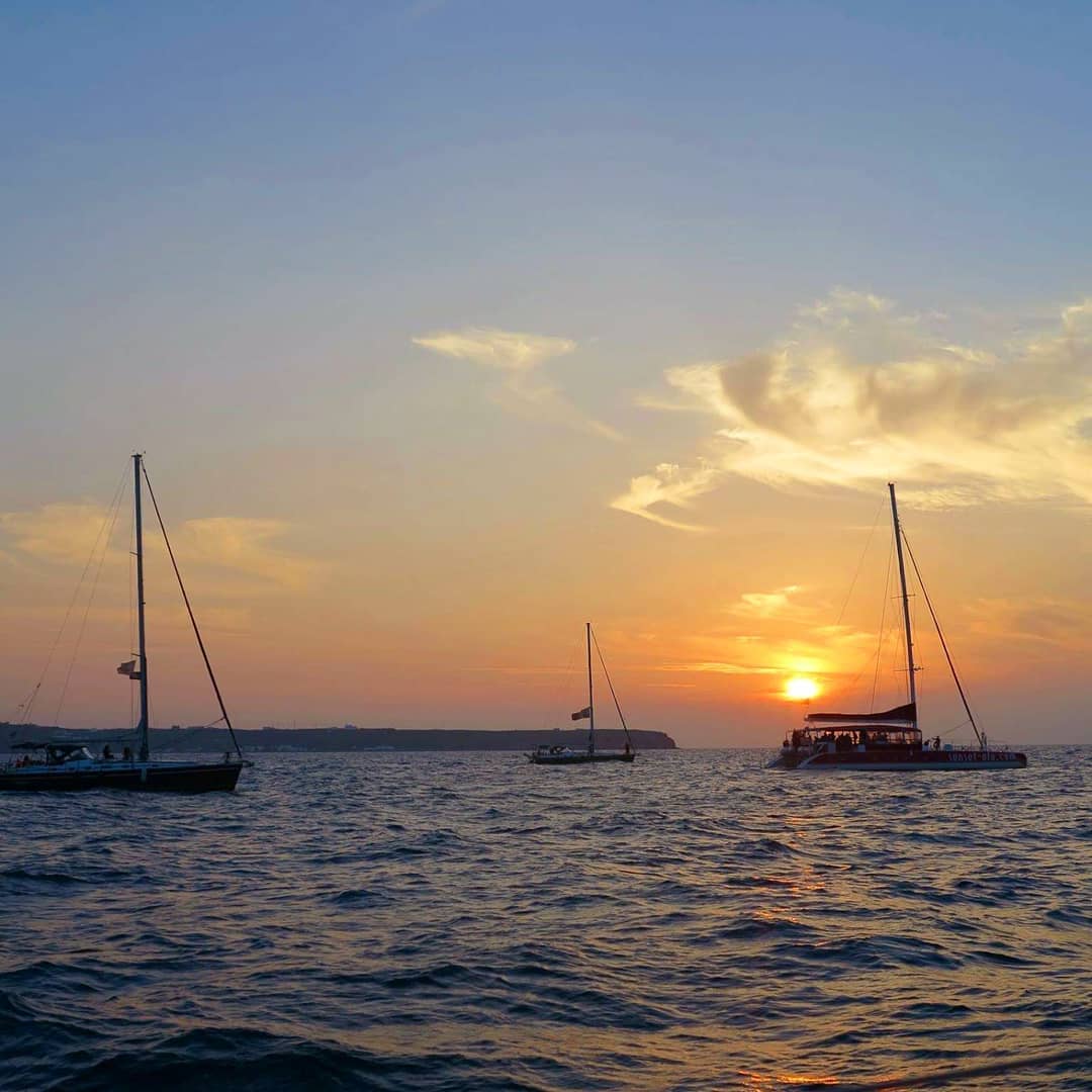 Sunset Oia boating in Santorini